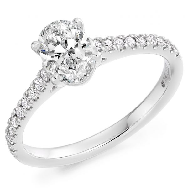 oval diamond ring with diamond set shoulders